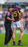 14 June 2014; Wexford manager Liam Dunne has words of advice for corner forward Jack Guiney. Leinster GAA Hurling Senior Championship, Semi-Final, Wexford v Dublin, Wexford Park, Wexford. Picture credit: Ray McManus / SPORTSFILE