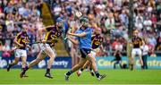 14 June 2014; Michael Carton, Dublin, in action against Jack Guiney, Wexford. Leinster GAA Hurling Senior Championship, Semi-Final, Wexford v Dublin, Wexford Park, Wexford. Picture credit: Ray McManus / SPORTSFILE