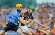 14 June 2014; Conor McDonald, Wexford, in action against Paul Schutte. Leinster GAA Hurling Senior Championship, Semi-Final, Wexford v Dublin, Wexford Park, Wexford. Picture credit: Dáire Brennan / SPORTSFILE