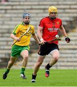 15 June 2014; Michael Turley, Down, in action against Jamsie Donnelly, Donegal. Ulster GAA Hurling Senior Championship, Down v Donegal, St Tiernach's Park, Clones, Co. Monaghan. Picture credit: Oliver McVeigh / SPORTSFILE