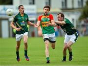 15 June 2014; Michael Meaney, Carlow, in action against Damien Carroll, left, and Caolan Young, Meath. Leinster GAA Football Senior Championship, Carlow v Meath, Dr. Cullen Park, Carlow. Picture credit: Barry Cregg / SPORTSFILE