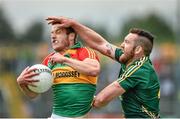 15 June 2014; Paul Broderick, Carlow, in action against Michael Burke, Meath. Leinster GAA Football Senior Championship, Carlow v Meath, Dr. Cullen Park, Carlow. Picture credit: Barry Cregg / SPORTSFILE
