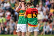 15 June 2014; Ciaran Moran, left, Carlow, reacts after he missed a goal chance, alongside team-mate Paul Broderick. Leinster GAA Football Senior Championship, Carlow v Meath, Dr. Cullen Park, Carlow. Picture credit: Barry Cregg / SPORTSFILE