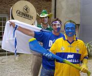 13 June 2006; Guinness have launched a major nationwide search for the country’s most fanatical hurling supporter, the eventual winner will be crowned “The Guinness Champion of Fans” live on TG4 the night before this years All-Ireland final. At the launch are hurling stars Davy Fitzgerald, front, Clare, Tony Browne, centre, Waterford, and Gary Hanniffy, Offaly. Ely Place, Dublin. Picture credit: Brian Lawless / SPORTSFILE