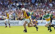 11 June 2006; David O'Connor, Wexford, in action against Aidan Hanrahan and Michael Cordial, right, Offaly. Guinness Leinster Senior Hurling Championship, Semi-Final, Offaly v Wexford, Nowlan Park, Kilkenny. Picture credit: Damien Eagers / SPORTSFILE