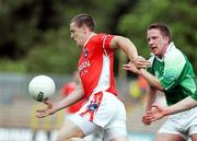 11 June 2006; John Paul Donnelly, Armagh, in action against Shane McDermott, Fermanagh. Bank of Ireland Ulster Senior Football Championship, Semi-Final, Armagh v Fermanagh, St. Tighernach's Park, Clones, Co. Monaghan. Picture credit: Oliver McVeigh / SPORTSFILE