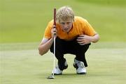13 June 2006; Simon Ward, Co. Louth, lines up a putt on the 3rd green during the quarter finals of the Irish Amateur Close Championship. European Club Golf Club, Brittas Bay, Co. Wicklow, Picture credit: Damien Eagers / SPORTSFILE