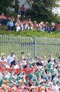 11 June 2006; Supporters watch on from a high vantage point overlooking the pitch. Bank of Ireland Ulster Senior Football Championship, Semi-Final, Armagh v Fermanagh, St. Tighernach's Park, Clones, Co. Monaghan. Picture credit: David Maher / SPORTSFILE