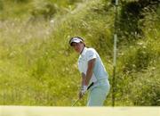 14 June 2006; Rory McIlroy, Holywood G.C., chips onto the 5th green during the final round of the Irish Amateur Close Championship. European Club Golf Club, Brittas Bay, Co. Wicklow, Picture credit: Pat Murphy / SPORTSFILE