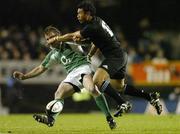 17 June 2006; Brian O'Driscoll, Ireland, is tackled by Casey Laulala, New Zealand. Summer Tour 2006, New Zealand v Ireland, Eden Park, Auckland, New Zealand. Picture credit: Matt Browne / SPORTSFILE