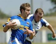 17 June 2006; Brian Kavanagh, Longford, in action against Shane Briggs, Waterford. Bank of Ireland All-Ireland Senior Football Championship Qualifier, Round 1, Waterford v Longford, Walsh Park, Waterford. Picture credit: Damien Eagers / SPORTSFILE