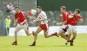 17 June 2006; Sean Cavanagh, Tyrone, in action against Martin Farrelly, left, Paddy Keenan and Peter McGinnity, right, Louth. Bank of Ireland All-Ireland Senior Football Championship Qualifier, Round 1, Louth v Tyrone, Pairc Tailteann, Navan, Co. Meath. Picture credit: Brendan Moran / SPORTSFILE