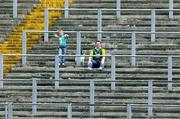 17 June 2006; A lone Antrim supporter and his daughter await the start of the game. Christy Ring Cup, Round 2, Antrim v Roscommon, Casement Park, Belfast, Co. Antrim. Picture credit: Oliver McVeigh / SPORTSFILE