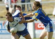 17 June 2006; Michael Ahern, Waterford, in action against Brian Kavanagh, right, and Padraig Berry, Longford. Bank of Ireland All-Ireland Senior Football Championship Qualifier, Round 1, Waterford v Longford, Walsh Park, Waterford. Picture credit: Damien Eagers / SPORTSFILE