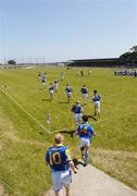 17 June 2006; The Longford team run onto the pitch. Bank of Ireland All-Ireland Senior Football Championship Qualifier, Round 1, Waterford v Longford, Walsh Park, Waterford. Picture credit: Damien Eagers / SPORTSFILE