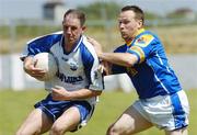 17 June 2006; Stephen Cunningham, Waterford, in action against Cathal Conefrey, Longford. Bank of Ireland All-Ireland Senior Football Championship Qualifier, Round 1, Waterford v Longford, Walsh Park, Waterford. Picture credit: Damien Eagers / SPORTSFILE