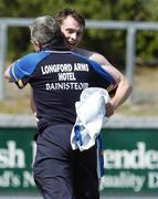 17 June 2006; Longford manager Luke Dempsey celebrates with Paul Barden after the game. Bank of Ireland All-Ireland Senior Football Championship Qualifier, Round 1, Waterford v Longford, Walsh Park, Waterford. Picture credit: Damien Eagers / SPORTSFILE