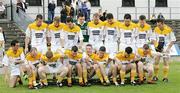 17 June 2006; The team bench collapses as the Antrim players prepare for the team picture. Bank of Ireland All-Ireland Senior Football Championship Qualifier, Round 1, Antrim v Clare, Casement Park, Belfast, Co. Antrim. Picture credit: Oliver McVeigh / SPORTSFILE