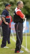 17 June 2006; Louth manager Eamon McEneaney, left, and Tyrone manager Mickey Harte watch from the sideline. Bank of Ireland All-Ireland Senior Football Championship Qualifier, Round 1, Louth v Tyrone, Pairc Tailteann, Navan, Co. Meath. Picture credit: Brendan Moran / SPORTSFILE