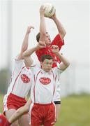 17 June 2006; Paddy Keenan, Louth, fields a high ball ahead of Colin Holmes, left, and Enda McGinley, Tyrone. Bank of Ireland All-Ireland Senior Football Championship Qualifier, Round 1, Louth v Tyrone, Pairc Tailteann, Navan, Co. Meath. Picture credit: Brendan Moran / SPORTSFILE