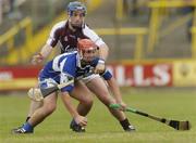17 June 2006; Michael McEvoy, Laois, in action against David Forde, Galway. Guinness All-Ireland Senior Hurling Championship Qualifier, Round 1, Laois v Galway, O'Moore Park, Portlaoise, Co. Laois. Picture credit: Brian Lawless / SPORTSFILE