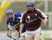 17 June 2006; Damien Hayes, Galway, in action against Joe Pheland, Laois. Guinness All-Ireland Senior Hurling Championship Qualifier, Round 1, Laois v Galway, O'Moore Park, Portlaoise, Co. Laois. Picture credit: Brian Lawless / SPORTSFILE