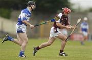 17 June 2006; Alan Kerins, Galway, in action against John Walsh, Laois. Guinness All-Ireland Senior Hurling Championship Qualifier, Round 1, Laois v Galway, O'Moore Park, Portlaoise, Co. Laois. Picture credit: Brian Lawless / SPORTSFILE