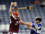 17 June 2006; Cathal Connolly, Galway, in action against Pakie Cuddy, Laois. Guinness All-Ireland Senior Hurling Championship Qualifier, Round 1, Laois v Galway, O'Moore Park, Portlaoise, Co. Laois. Picture credit: Brian Lawless / SPORTSFILE