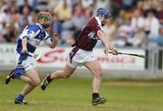 17 June 2006; David Forde, Galway, in action against John A Delaney, Laois. Guinness All-Ireland Senior Hurling Championship Qualifier, Round 1, Laois v Galway, O'Moore Park, Portlaoise, Co. Laois. Picture credit: Brian Lawless / SPORTSFILE