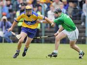 18 June 2006;  Tony Griffin, Clare, in action against Mark O'Riordan, Limerick. Guinness All-Ireland Senior Hurling Championship Qualifier, Round 1, Clare v Limerick, Cusack Park, Ennis, Co. Clare. Picture credit: Kieran Clancy / SPORTSFILE