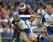 18 June 2006; Michael Walsh, Waterford, in action against Paul Greville, Westmeath. Guinness All-Ireland Senior Hurling Championship Qualifier, Round 1, Westmeath v Waterford, Cusack Park, Mullingar, Co. Westmeath. Picture credit: Pat Murphy / SPORTSFILE