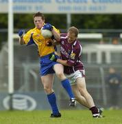 18 June 2006; Stuart Daly, Roscommon, in action against Michael Donnellan, Galway. Bank of Ireland Connacht Senior Football Championship Semi-Final, Roscommon v Galway, Dr. Hyde Park, Co. Roscommon. Picture credit: Ray McManus / SPORTSFILE