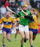 18 June 2006; Gerry Quinn, Clare, in action against Niall Moran, Limerick. Guinness All-Ireland Senior Hurling Championship Qualifier, Round 1, Clare v Limerick, Cusack Park, Ennis, Co. Clare. Picture credit: Kieran Clancy / SPORTSFILE