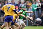 18 June 2006; Brian Lohan and Sean McMahon, Clare, in action against Andrew O'Shaughnessy, Limerick. Guinness All-Ireland Senior Hurling Championship Qualifier, Round 1, Clare v Limerick, Cusack Park, Ennis, Co. Clare. Picture credit: Kieran Clancy / SPORTSFILE