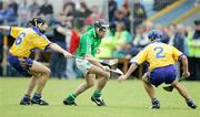 18 June 2006; Sean McMahon and Gerry O'Grady, Clare, in action against Mark Keane, Limerick. Guinness All-Ireland Senior Hurling Championship Qualifier, Round 1, Clare v Limerick, Cusack Park, Ennis, Co. Clare. Picture credit: Kieran Clancy / SPORTSFILE