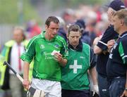 18 June 2006; Limerick's Donie Ryan leaves the pitch with a blood injury. Guinness All-Ireland Senior Hurling Championship Qualifier, Round 1, Clare v Limerick, Cusack Park, Ennis, Co. Clare. Picture credit: Kieran Clancy / SPORTSFILE