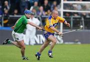 18 June 2006; Colin Lynch, Clare, in action against Brian Geary, Limerick. Guinness All-Ireland Senior Hurling Championship Qualifier, Round 1, Clare v Limerick, Cusack Park, Ennis, Co. Clare. Picture credit: Kieran Clancy / SPORTSFILE