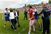 15 June 2014; Darren Hughes, Monaghan, left, and Conor Gormley, Tyrone, in dispute after the game as Monaghan manager Malachy O'Rourke watches on. Ulster GAA Football Senior Championship, Semi-Final, Monaghan v Tyrone, St Tiernach's Park, Clones, Co. Monaghan. Picture credit: Oliver McVeigh / SPORTSFILE