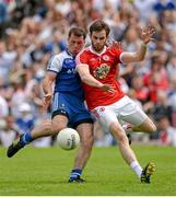 15 June 2014; Padraig Donaghy, Monaghan, has his goal bound shot blocked by Ronan McNamee, Tyrone. Ulster GAA Football Senior Championship, Semi-Final, Monaghan v Tyrone, St Tiernach's Park, Clones, Co. Monaghan. Picture credit: Oliver McVeigh / SPORTSFILE