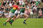 15 June 2014; Michael Newman, Meath, in action against Daniel St. Ledger, Carlow. Leinster GAA Football Senior Championship, Carlow v Meath, Dr. Cullen Park, Carlow. Picture credit: Barry Cregg / SPORTSFILE