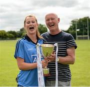 15 May 2014; Dublin's Sarah McCaffrey and her dad Noel celebrate with the cup after the game. Aisling McGing Ladies U21 Football Final, Dublin v Meath, Clane, Co. Kildare. Picture credit: Piaras Ó Mídheach / SPORTSFILE