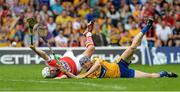 15 June 2014; Patrick Cronin, Cork, in action against David McInerney, Clare. Munster GAA Hurling Senior Championship, Semi-Final, Clare v Cork, Semple Stadium, Thurles, Co. Tipperary. Picture credit: Dáire Brennan / SPORTSFILE