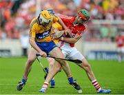 15 June 2014; Conor McGrath, Clare, in action against Stephen McDonnell, Cork. Munster GAA Hurling Senior Championship, Semi-Final, Clare v Cork, Semple Stadium, Thurles, Co. Tipperary. Picture credit: Dáire Brennan / SPORTSFILE