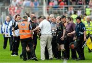 15 June 2014; Clare selector Mike Deegan confronts referee James McGrath at half time. Munster GAA Hurling Senior Championship, Semi-Final, Clare v Cork, Semple Stadium, Thurles, Co. Tipperary. Picture credit: Dáire Brennan / SPORTSFILE