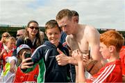 15 June 2014; Cork full back Damien Cahalane poses for a selfie with fans after the game. Munster GAA Hurling Senior Championship, Semi-Final, Clare v Cork, Semple Stadium, Thurles, Co. Tipperary. Picture credit: Ray McManus / SPORTSFILE