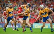 15 June 2014; Seamus Harnedy, Cork, is tackled by David McInerney, Clare. Munster GAA Hurling Senior Championship, Semi-Final, Clare v Cork, Semple Stadium, Thurles, Co. Tipperary. Picture credit: Ray McManus / SPORTSFILE