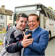 15 June 2014; Stephen Rice, Mallow, takes a selfie with RTÉ's Marty Morrissey as the Cork team arrives. Munster GAA Hurling Senior Championship, Semi-Final, Clare v Cork, Semple Stadium, Thurles, Co. Tipperary. Picture credit: Ray McManus / SPORTSFILE