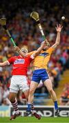 15 June 2014; David McInerney, Clare, reaches for a high ball with Patrick Cronin, Cork. Munster GAA Hurling Senior Championship, Semi-Final, Clare v Cork, Semple Stadium, Thurles, Co. Tipperary. Picture credit: Ray McManus / SPORTSFILE