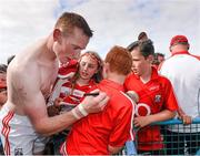 15 June 2014; Cork full back Damien Cahalane is signs the shirt of James Millerick, aged 10, from Kilcredan, after the game. Munster GAA Hurling Senior Championship, Semi-Final, Clare v Cork, Semple Stadium, Thurles, Co. Tipperary. Picture credit: Ray McManus / SPORTSFILE