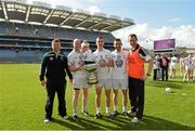7 June 2014; Kildare backroom staff, Dermot Coulston, left, statsman and Tom O'Meara, selector, right, with players, Richie Hoban, with his daughter Lucy, Martin Fitzgerald, Peter Coleman, all from Ardclough GAA club. Christy Ring Cup Final, Kerry v Kildare, Croke Park, Dublin. Picture credit: Piaras Ó Mídheach / SPORTSFILE